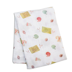 Closeup of Lulujo football swaddle pattern showing breathable cotton for gentle baby comfort.