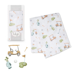 Lulujo Golf Swaddle blanket close-up shows soft muslin for gentle newborn swaddling comfort