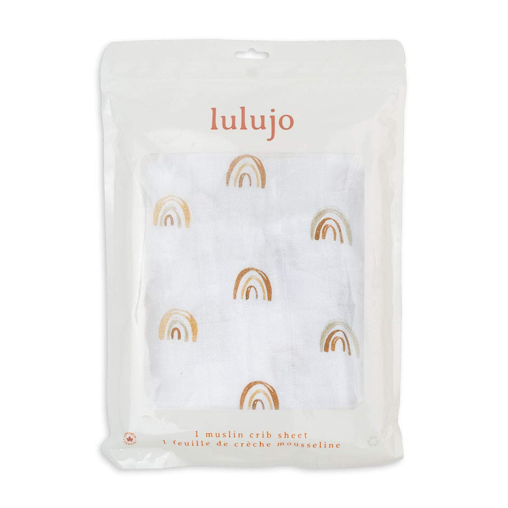 Lulujo Muslin Crib Sheet Rainbows snug-fit profile with elastic band for secure fit.
