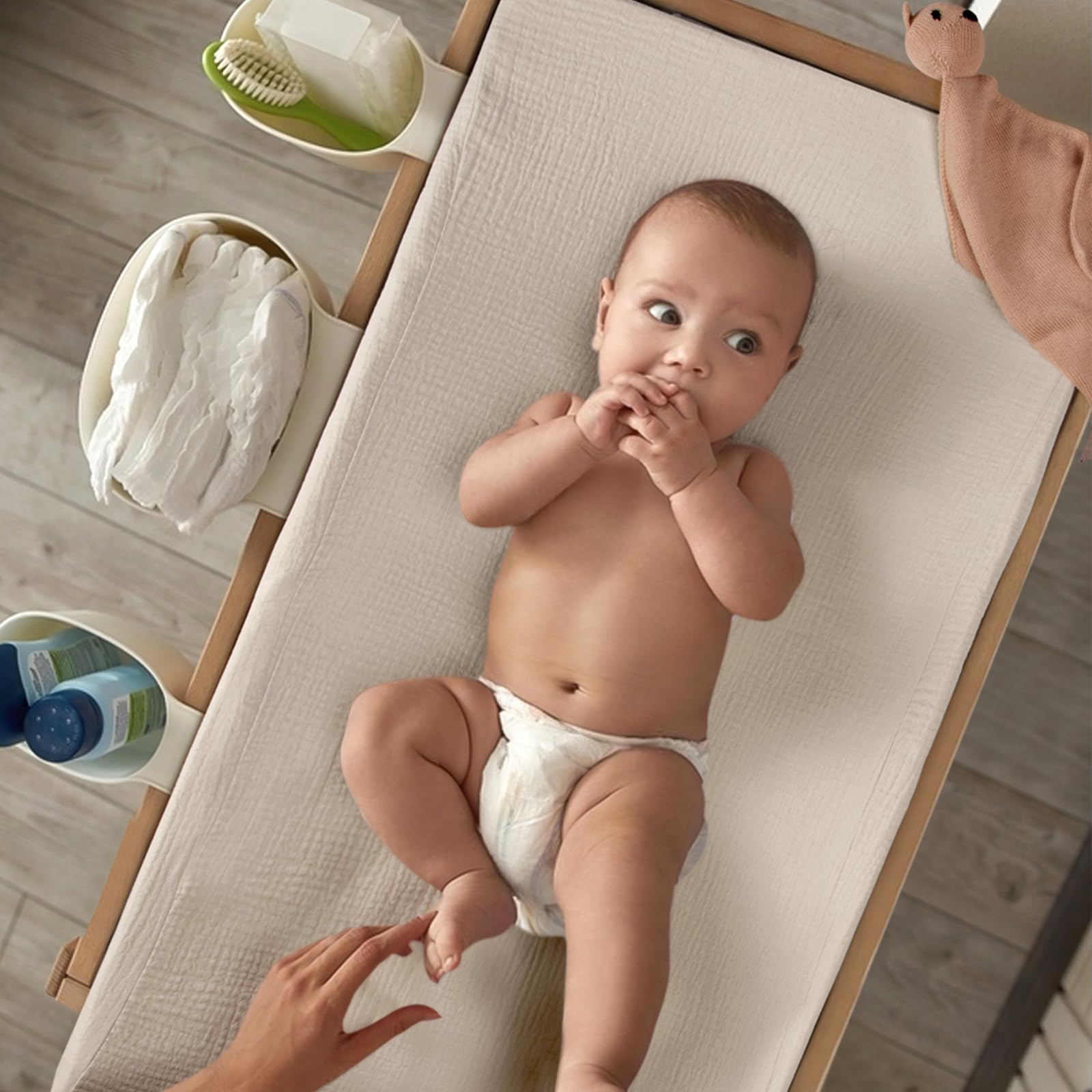 Lulumoon changing pad cover buckle holes for safety strap compatibility