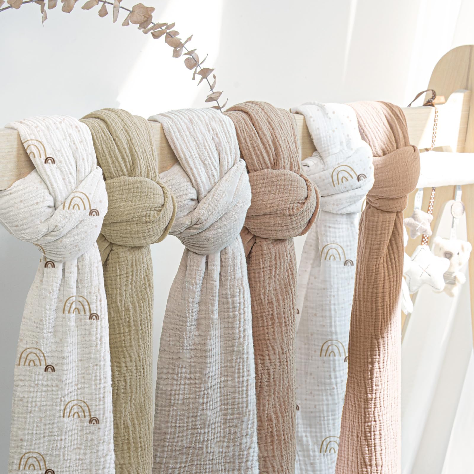 Lulumoon baby muslin swaddle blanket doubles as burp cloth.