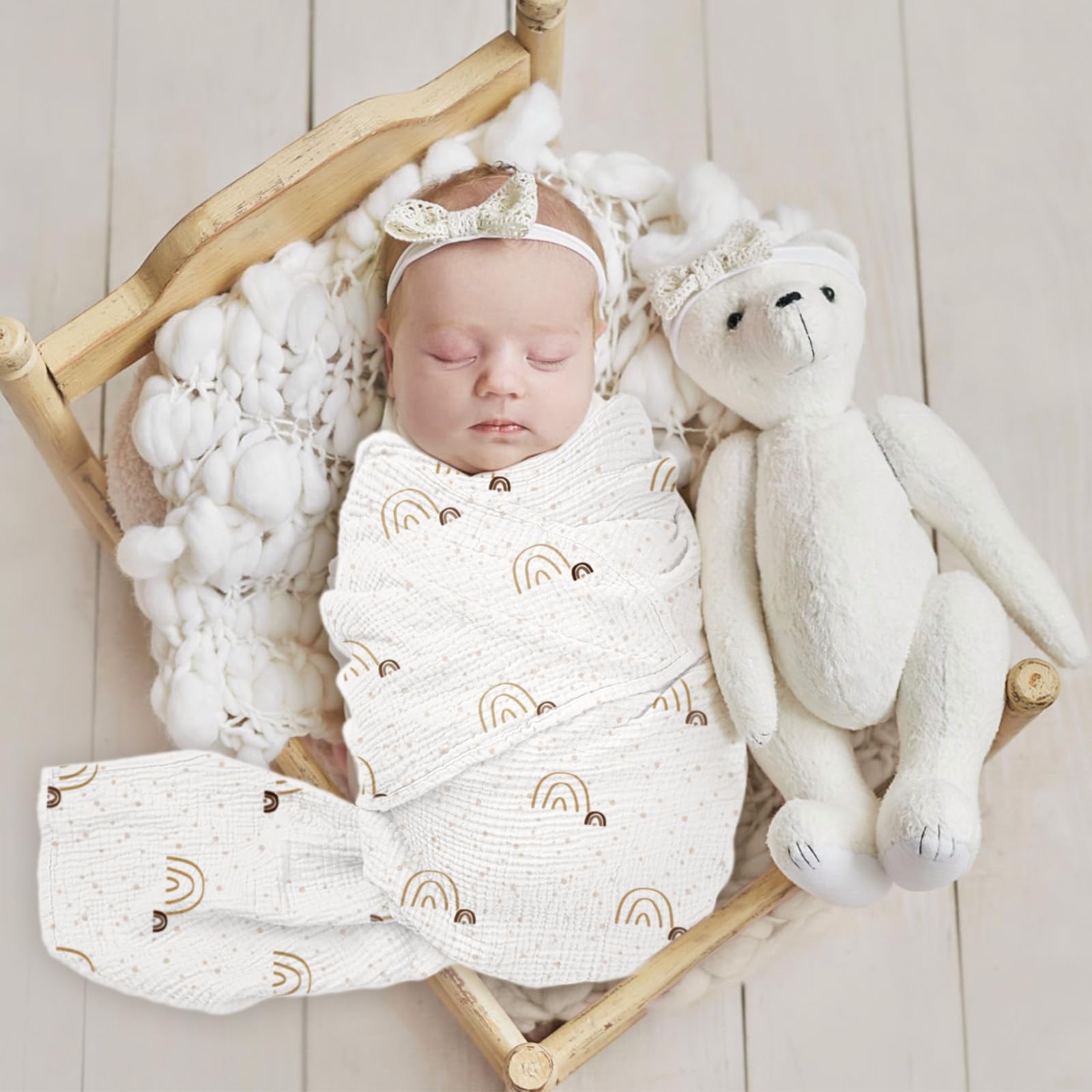 Lulumoon baby muslin swaddle blanket fabric closeup reveals breathable 100% cotton texture.