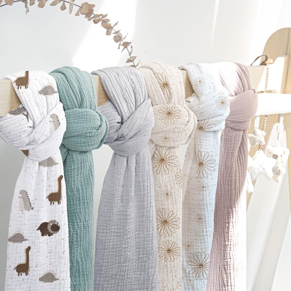 Lulumoon swaddle serves as a burp cloth with soft cotton weave