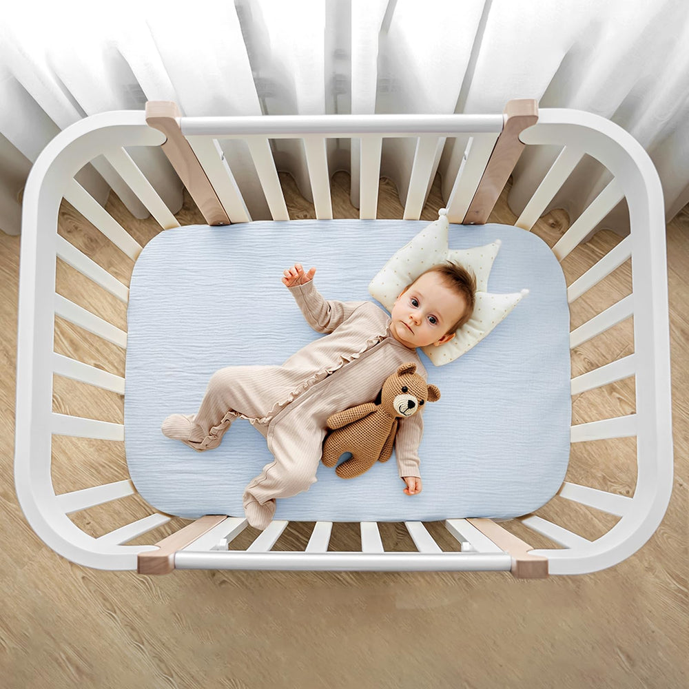 Lulumoon bassinet sheets gift packaging neutral color for new parents.