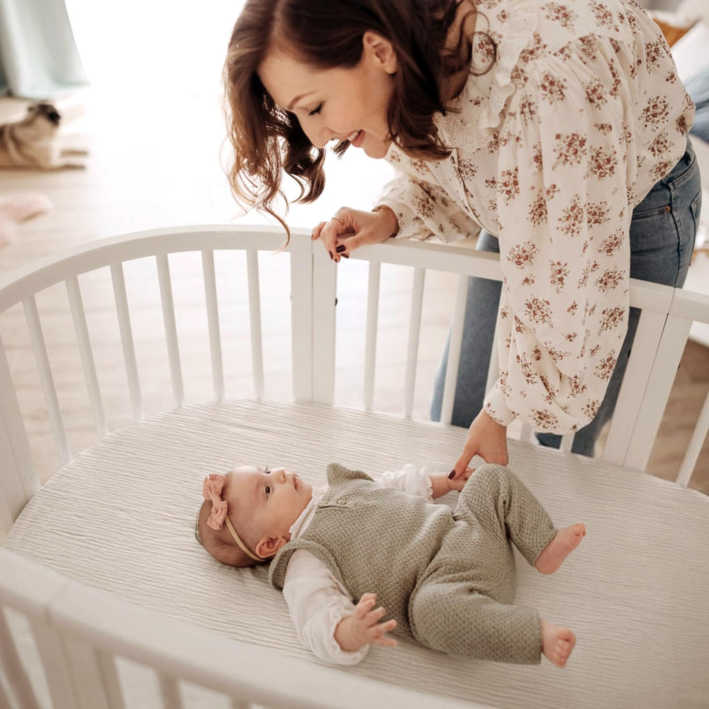 Lulumoon bassinet sheets universal-fit image highlights 33x17x4 inches for oval, rectangle, hourglass.