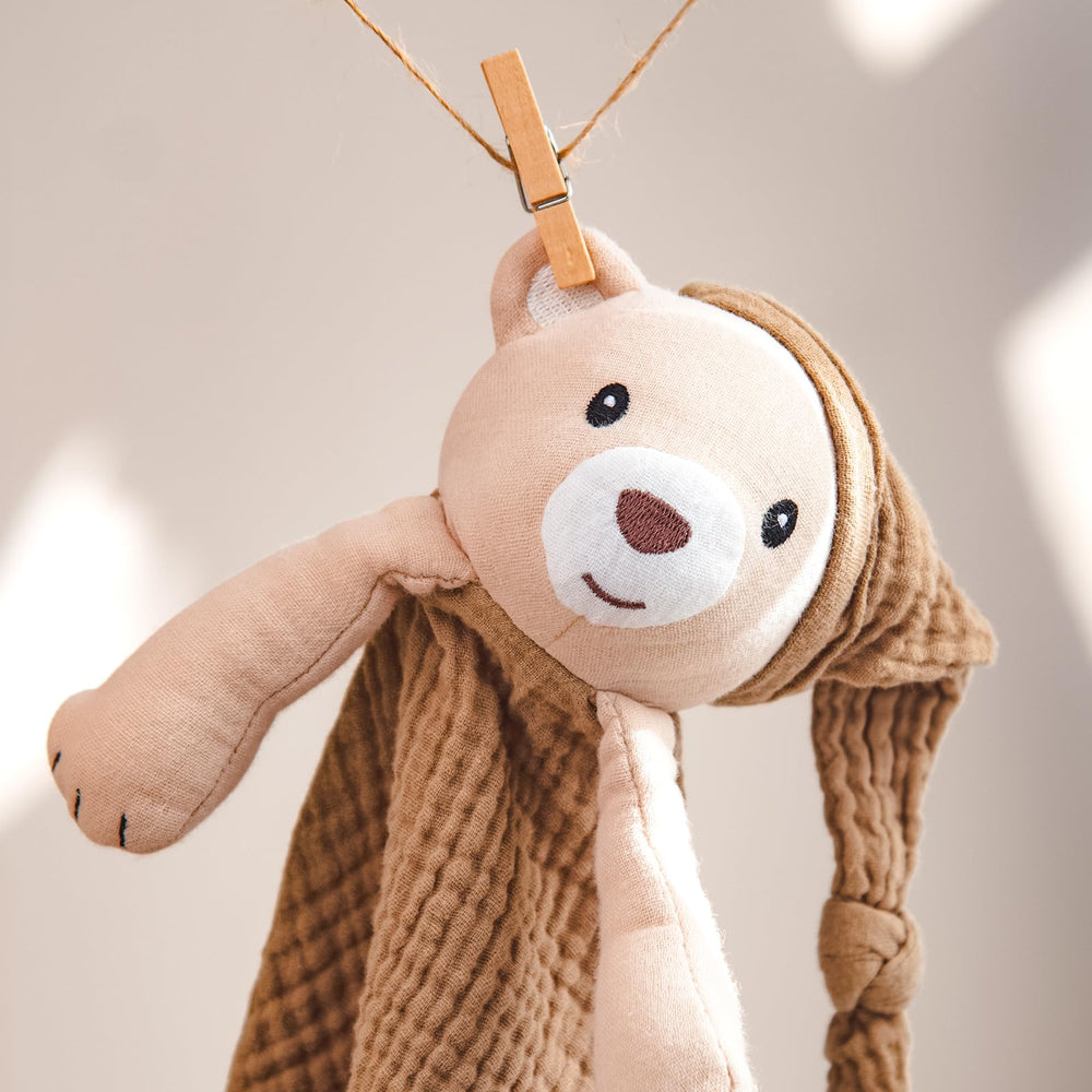 Lulumoon bear lovey travel-use scene emphasizes portable comfort.