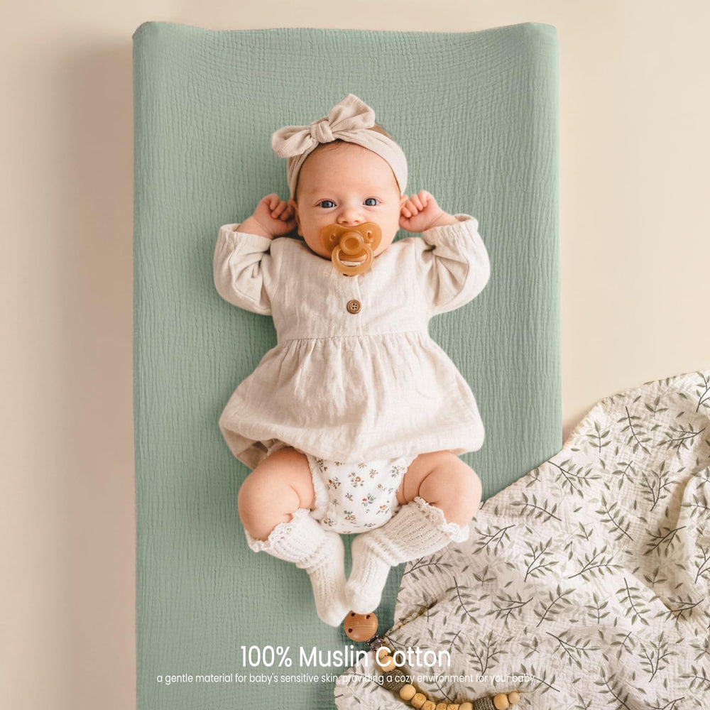 lulumoon changing pad cover buckle openings - easy safety strap access.