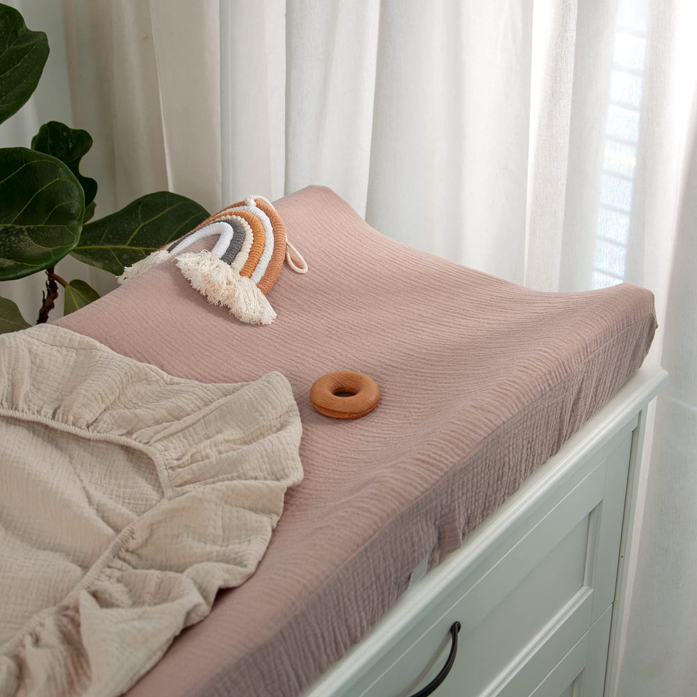 Lulumoon changing pad cover fits most pads at 17x33 inches for easy setup