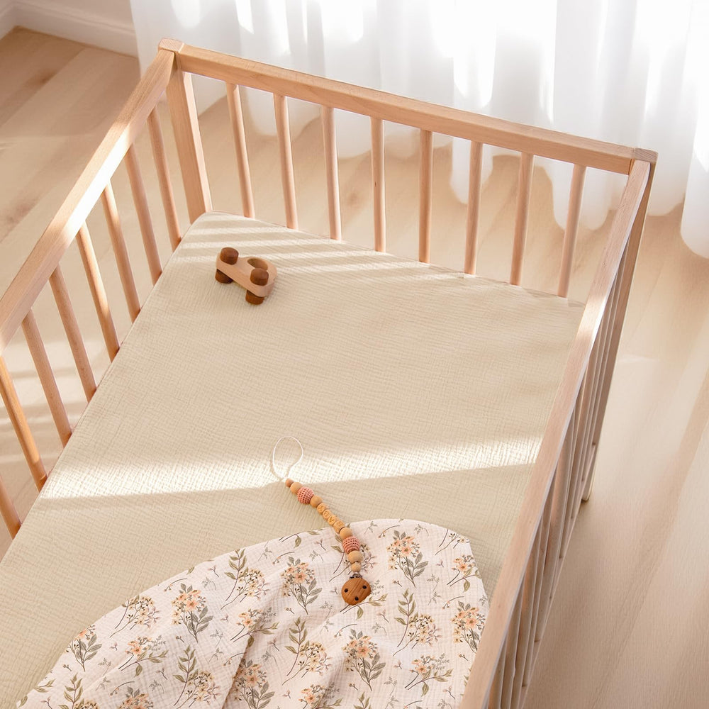 Lulumoon fitted crib sheets: machine-wash-ready texture highlights easy-care for busy parents.