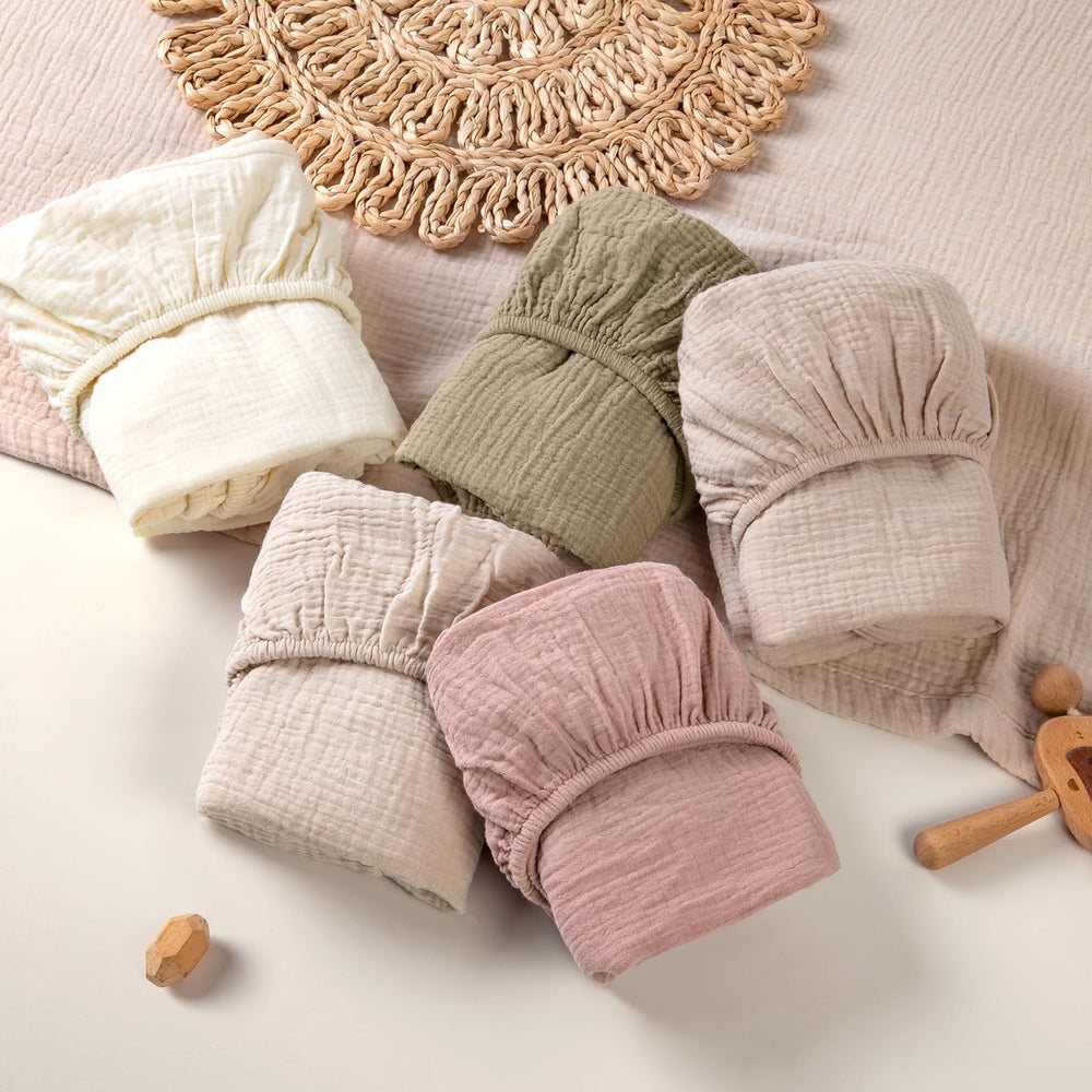 lulumoon muslin bassinet sheets secure fit demo prevents shifting during sleep.