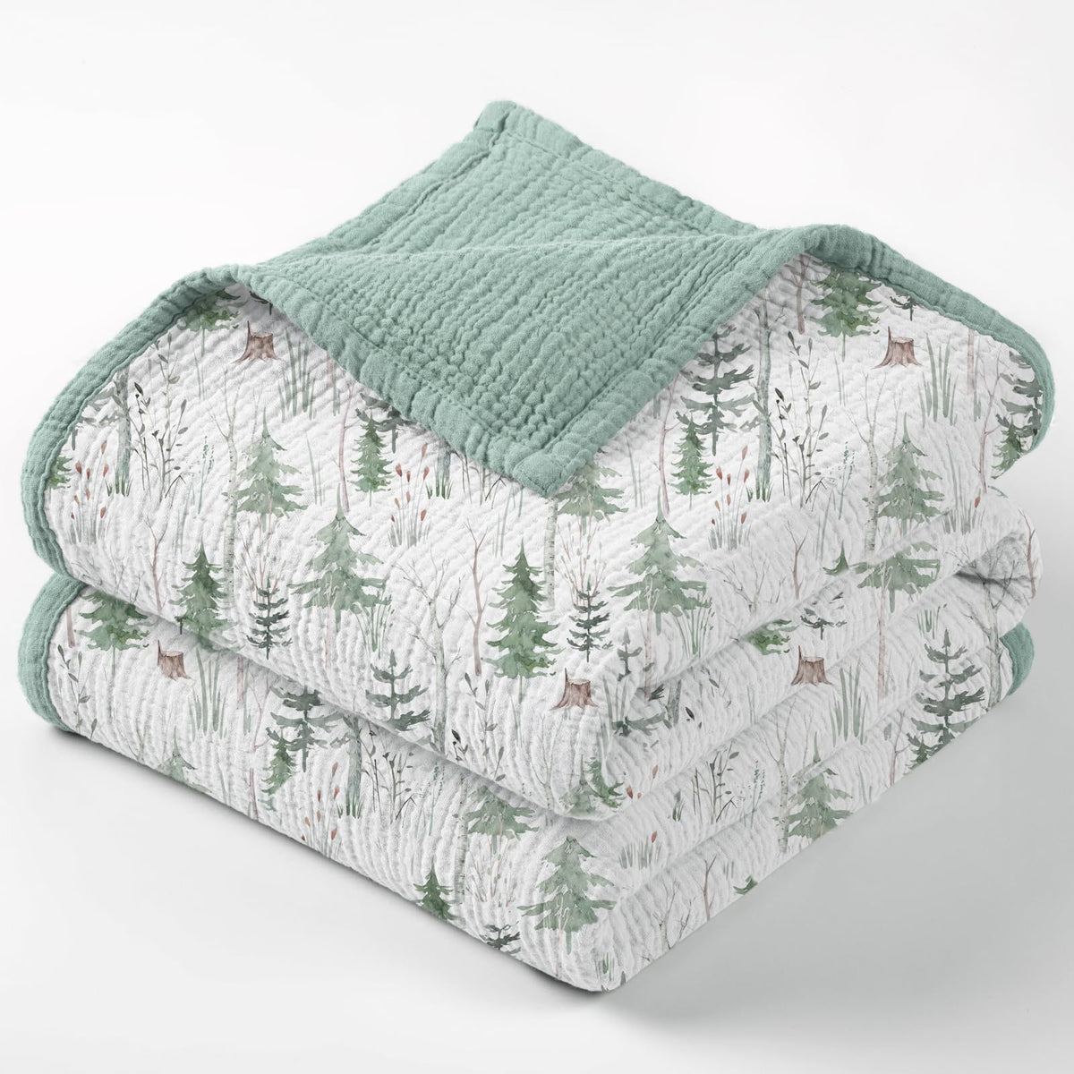Lulumoon Muslin Blanket Green Forest Stump draped on crib for cozy sleep