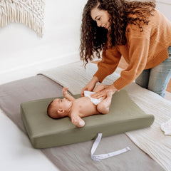 Lulumoon muslin changing pad cover on pad demonstrates breathable comfort during changes