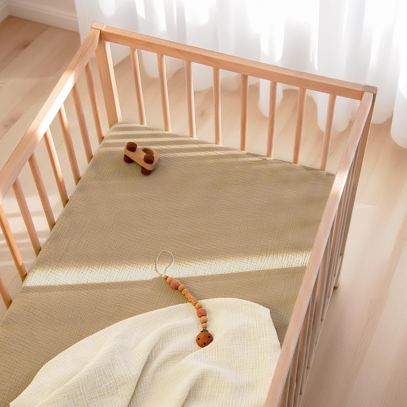 Lulu Moon muslin crib sheets fabric close-up emphasizing softness and breathability