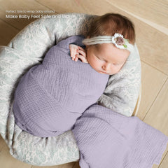 lulumoon muslin swaddle blanket baby swaddled sleeps calmly in breathable fabric