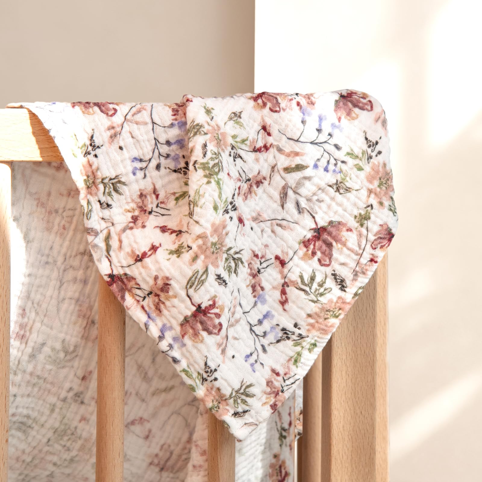 Lulumoon Muslin Swaddle Blanket doubles as burp cloth for quick cleanup.
