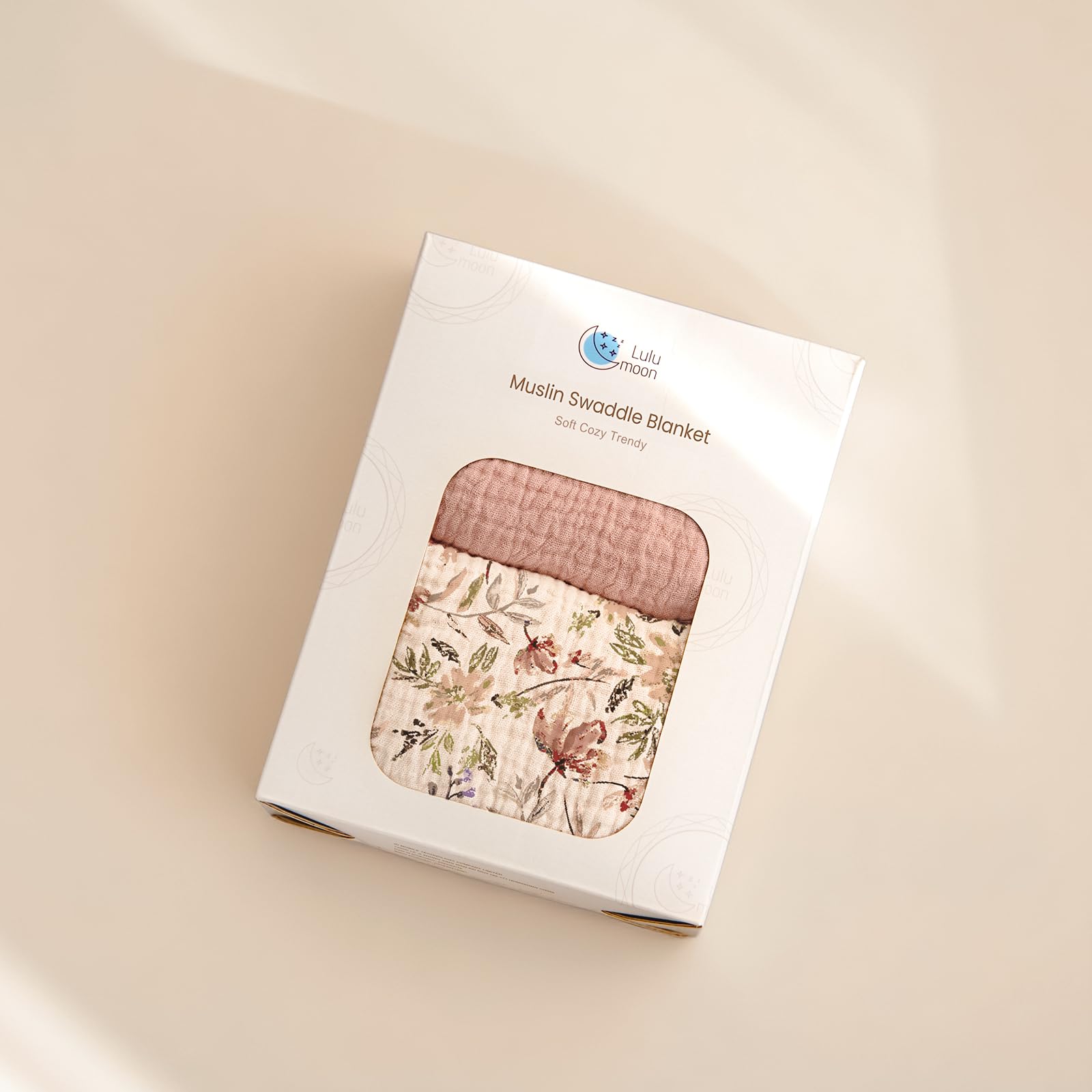 Lulumoon Muslin Swaddle Blanket presented in gift packaging for new baby celebrations.