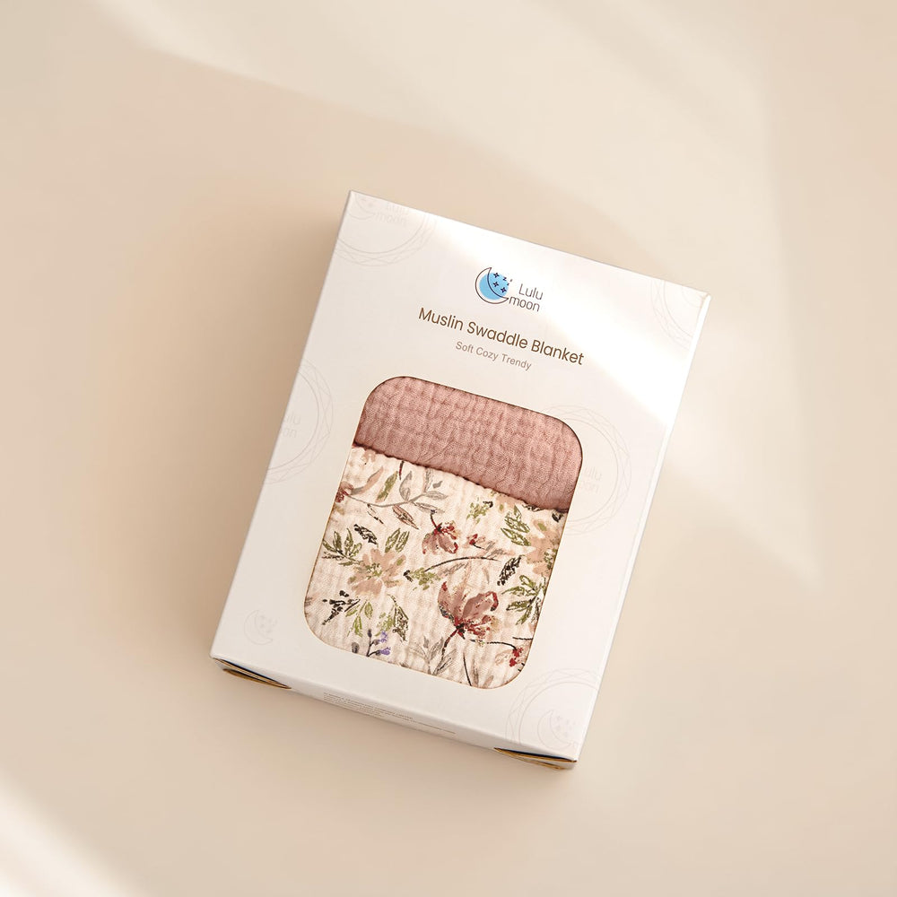 Lulumoon Muslin Swaddle Blanket presented in gift packaging for new baby celebrations.