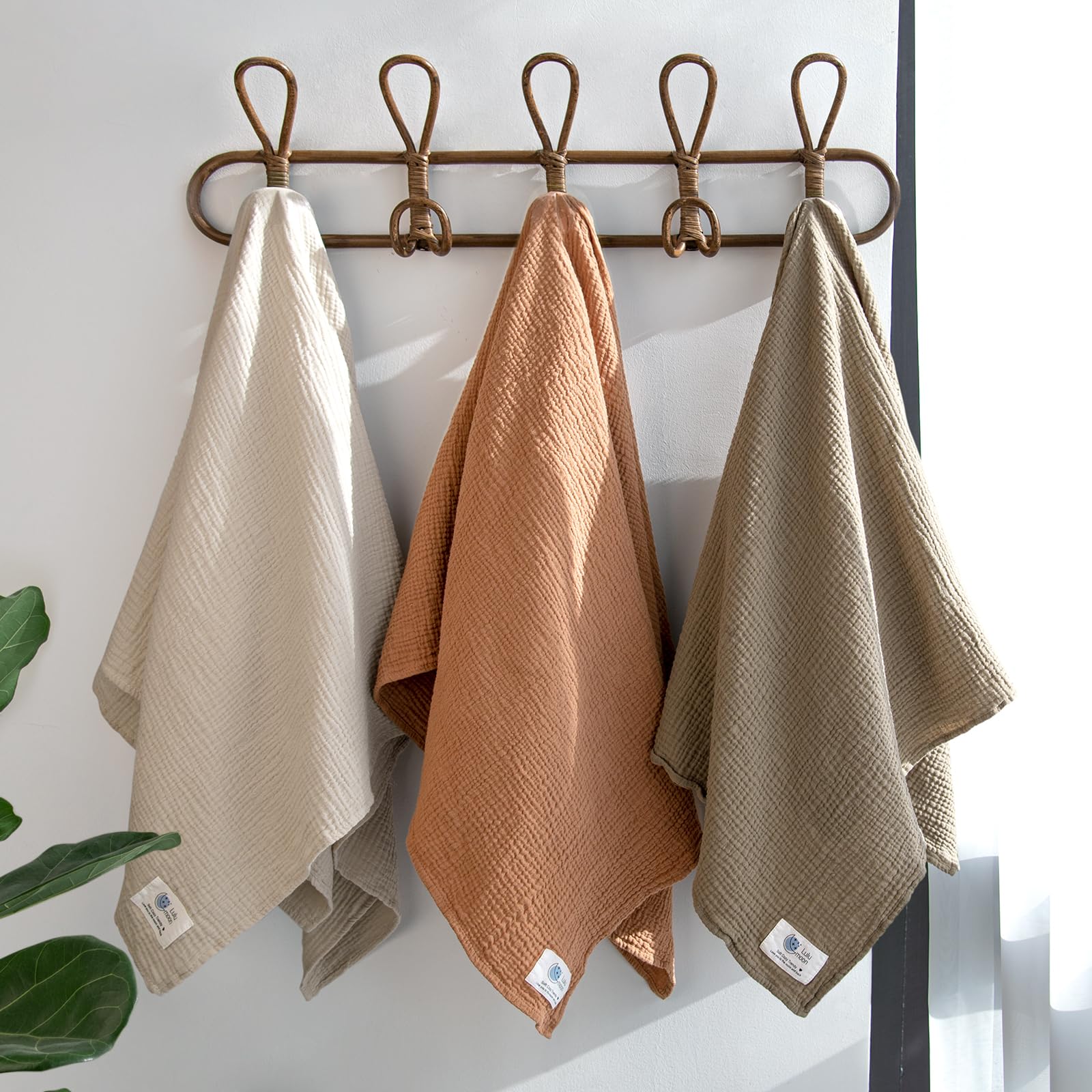 Lulumoon Muslin Swaddle Olive 3-pack shown for convenient, coordinated care.