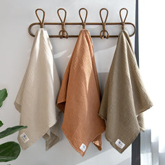 Lulumoon Muslin Swaddle Olive 3-pack shown for convenient, coordinated care.