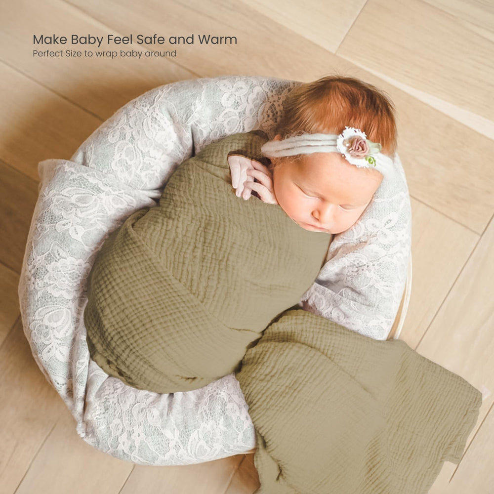 lulumoon muslin swaddle blanket olive branche nursery scene with neutral gifting style