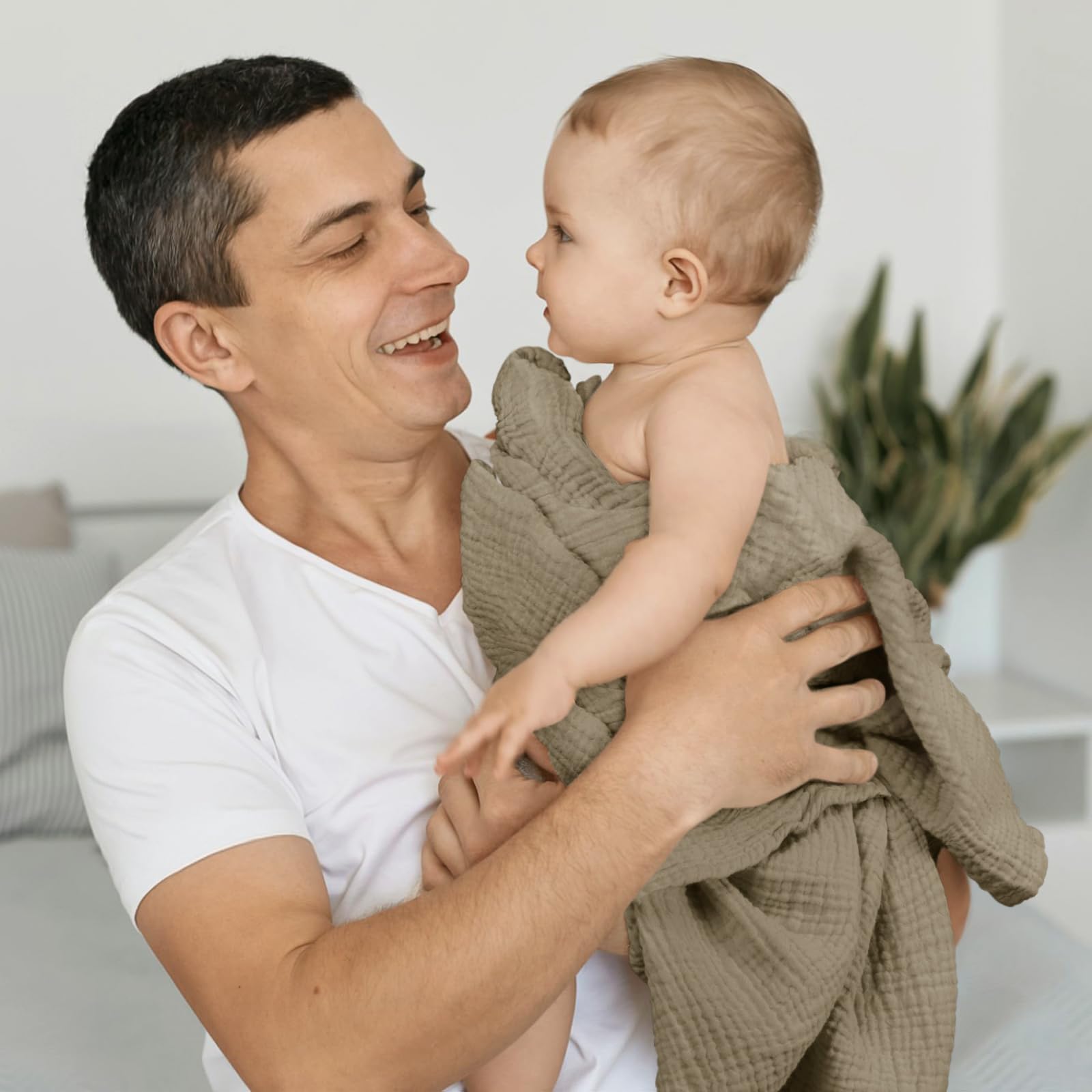 Lulumoon Swaddle Olive acts as stroller sun-shield during outings.