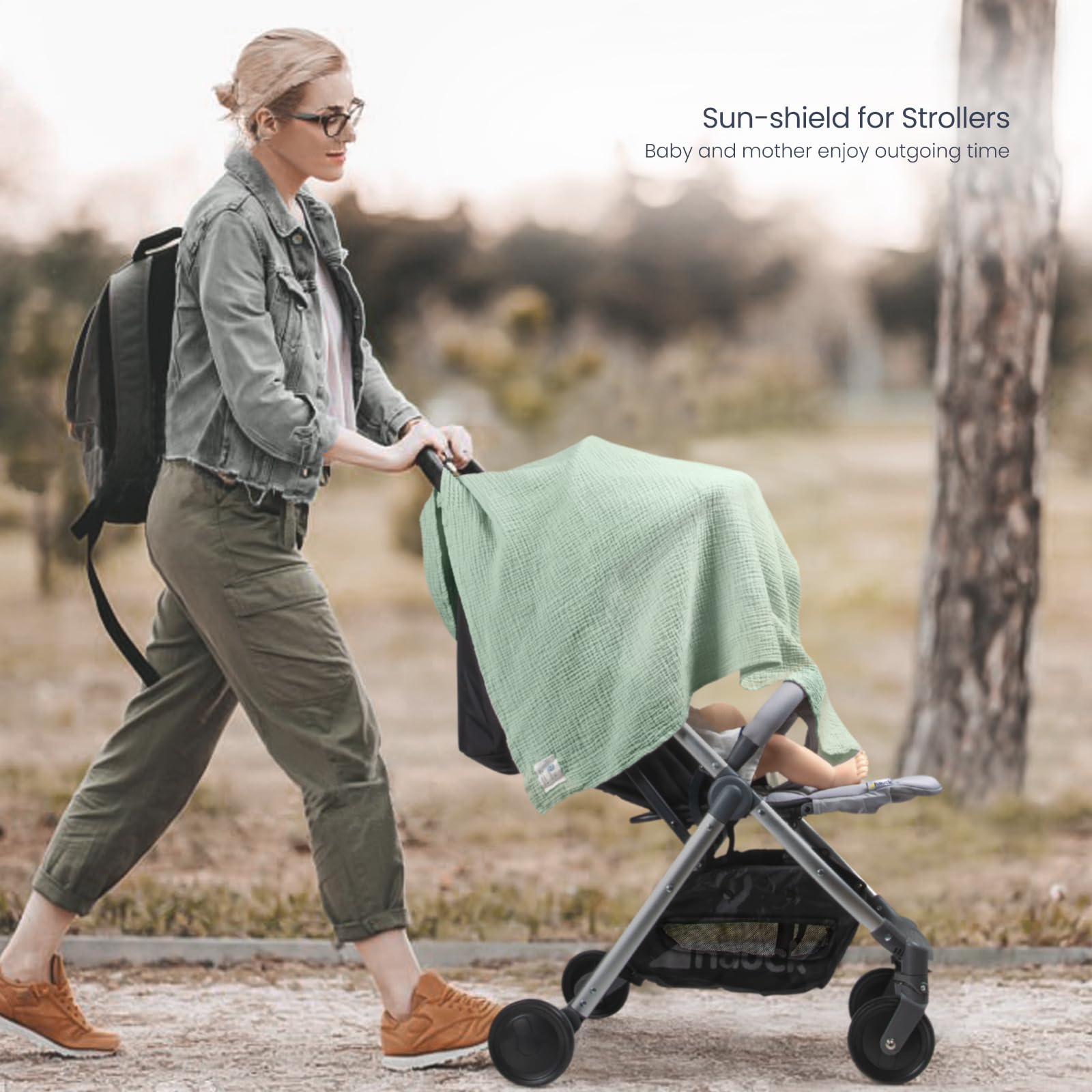 Lulumoon Muslin Swaddle used as sun shield during stroller rides