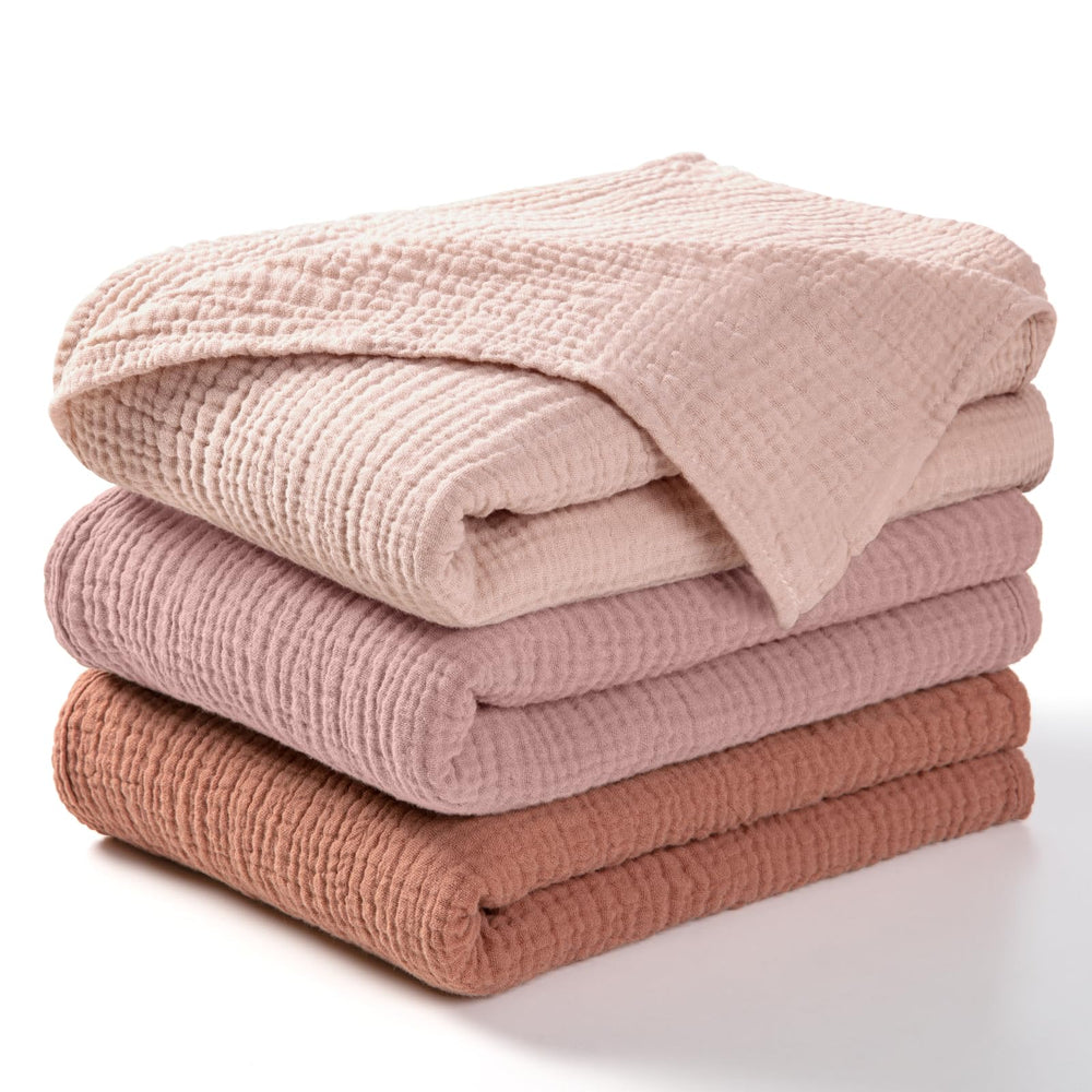lulumoon Muslin Swaddle Chestnut pack-front shows lightweight, breathable comfort for newborn calm