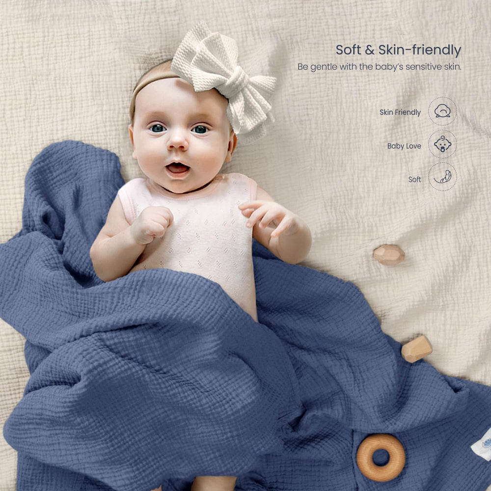 lulumoon muslin swaddle navy newborn fabric texture and softness closeup