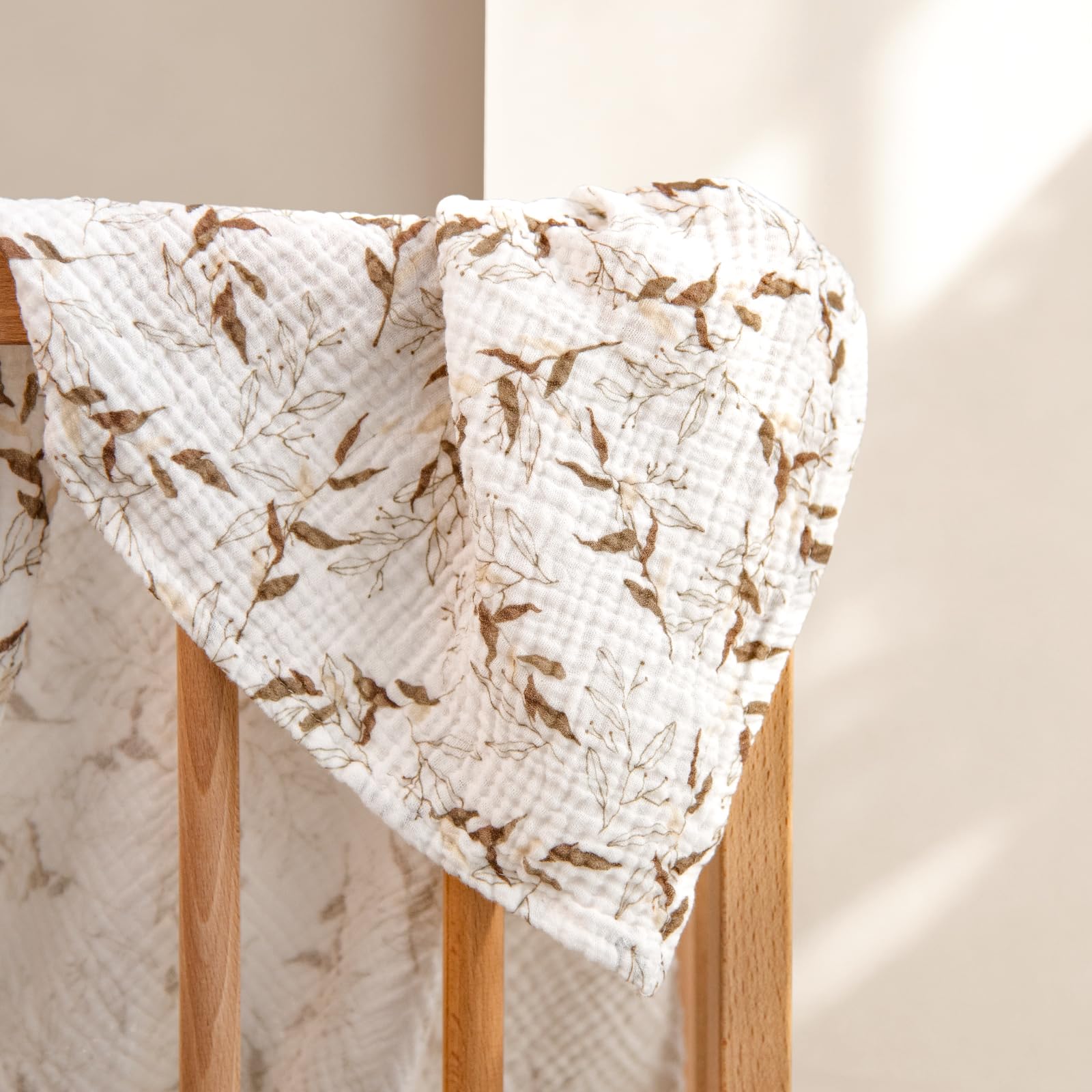 Lulumoon Muslin Swaddle stroller sun shield for shade during outings.