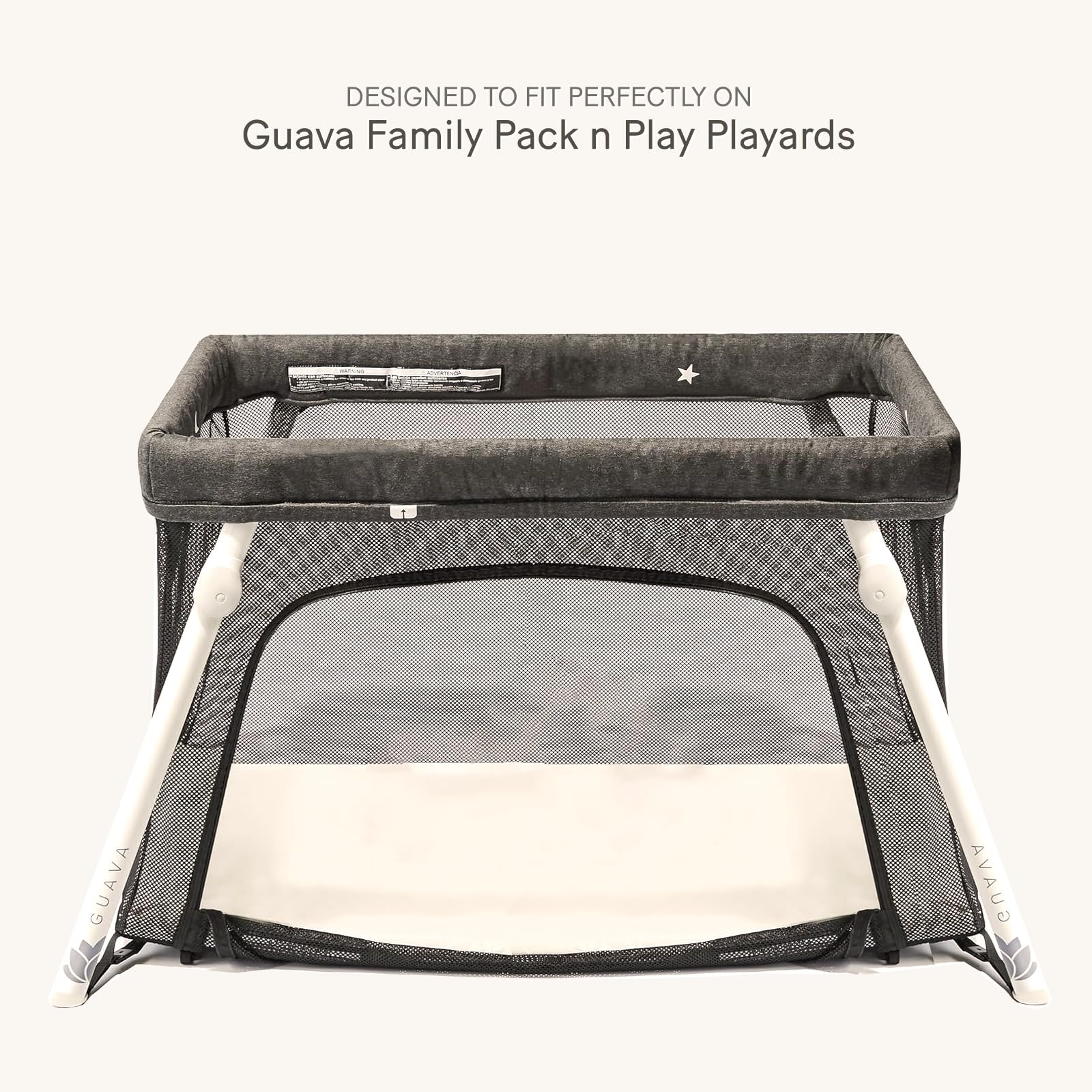 lulumoon snug-fit elastic-edge sheets secure a Guava Family Pack n Play during movement.