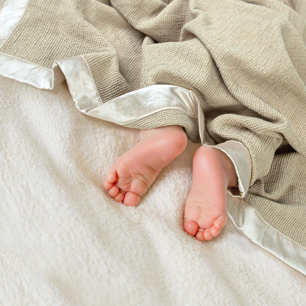 Lulumoon swaddle blanket nursery setup showing a versatile cozy cocoon