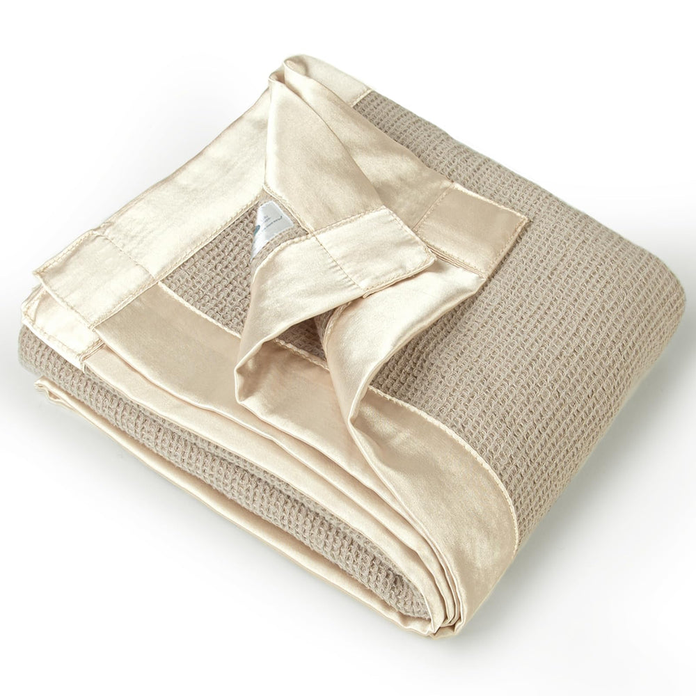 Lulumoon swaddle blanket waffle texture with satin edge for cozy newborn warmth