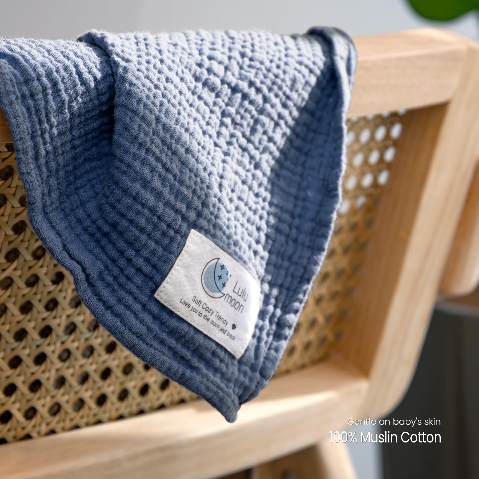lulumoon muslin swaddle navy nursing cover in use during feeding