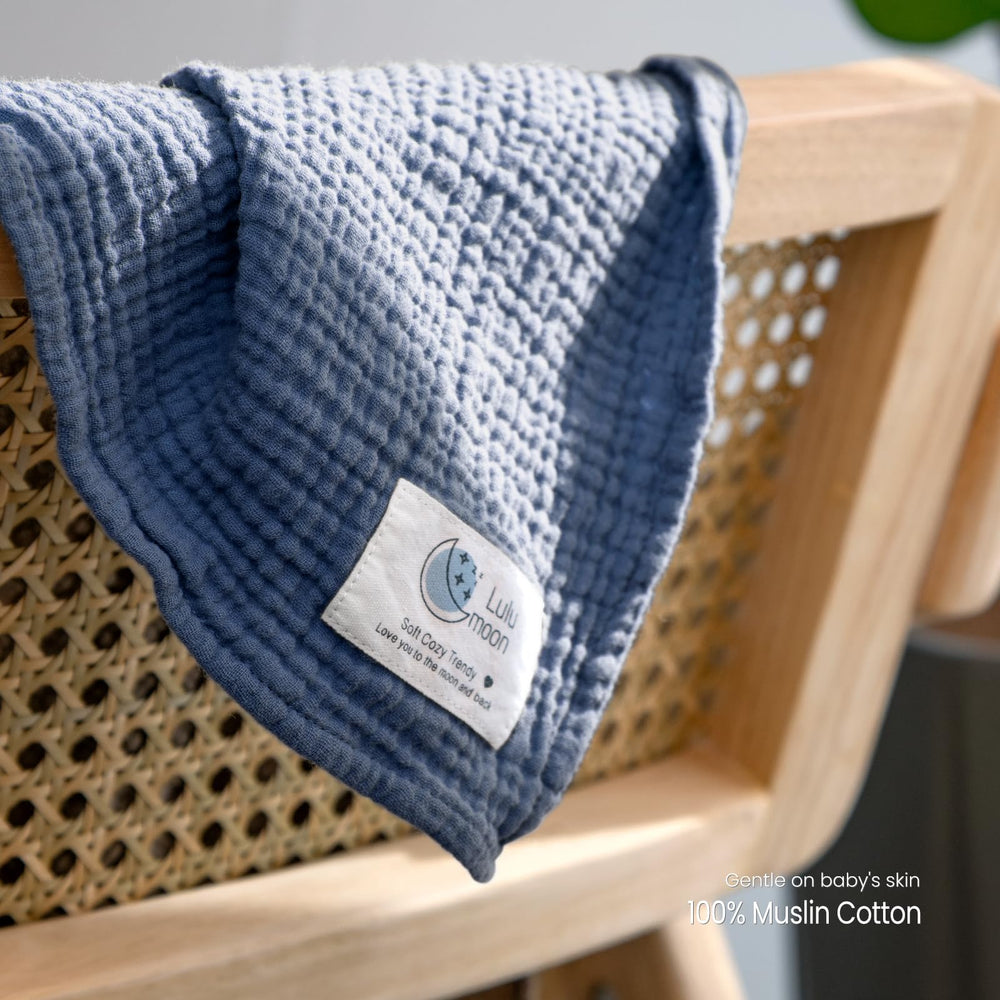 lulumoon muslin swaddle navy nursing cover in use during feeding