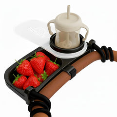 LUMARA universal stroller snack tray installed on a stroller for secure on-the-go snacks.
