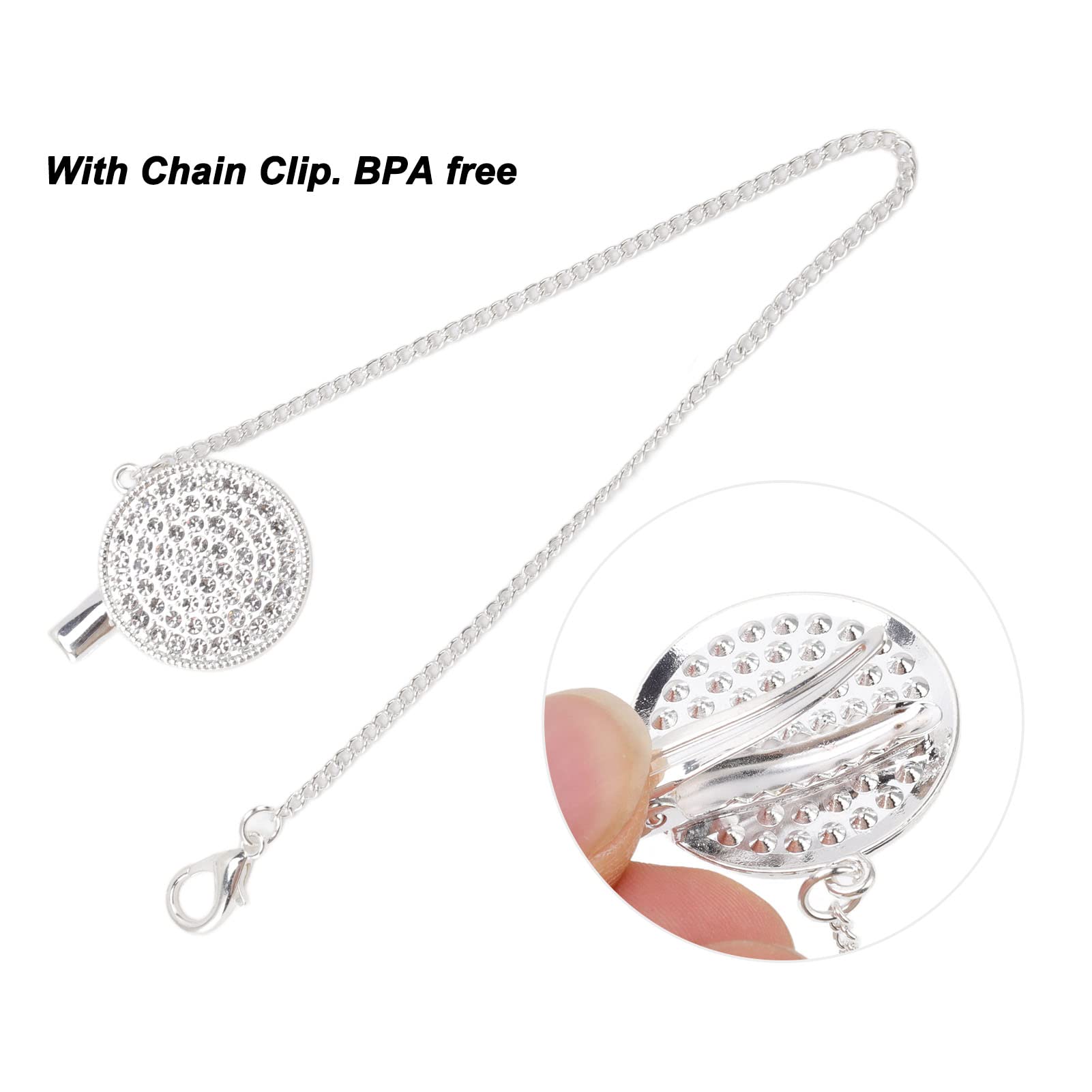 Luqeeg bling pacifier held by a baby during play.