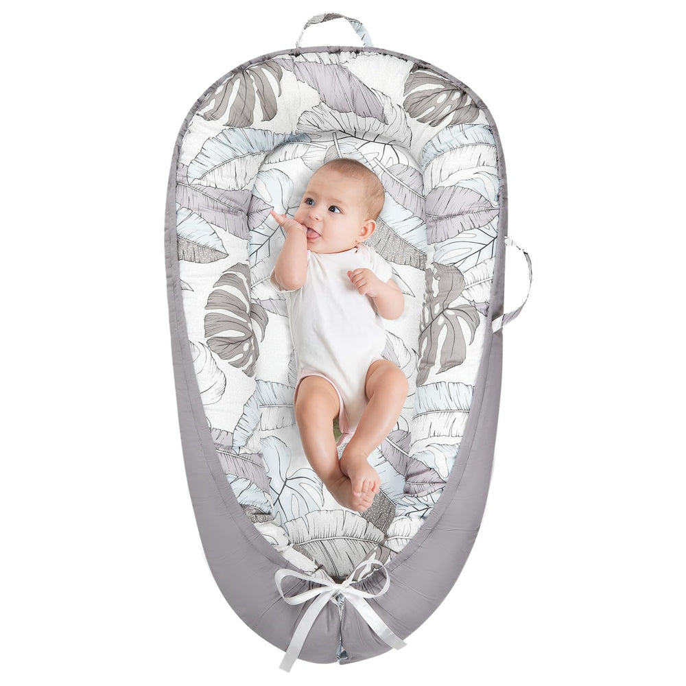 Lurui Baby Lounger reversible cover shows dual patterns for quick style changes.