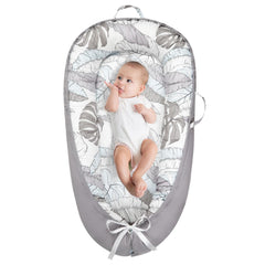 Lurui Baby Lounger reversible cover shows dual patterns for quick style changes.