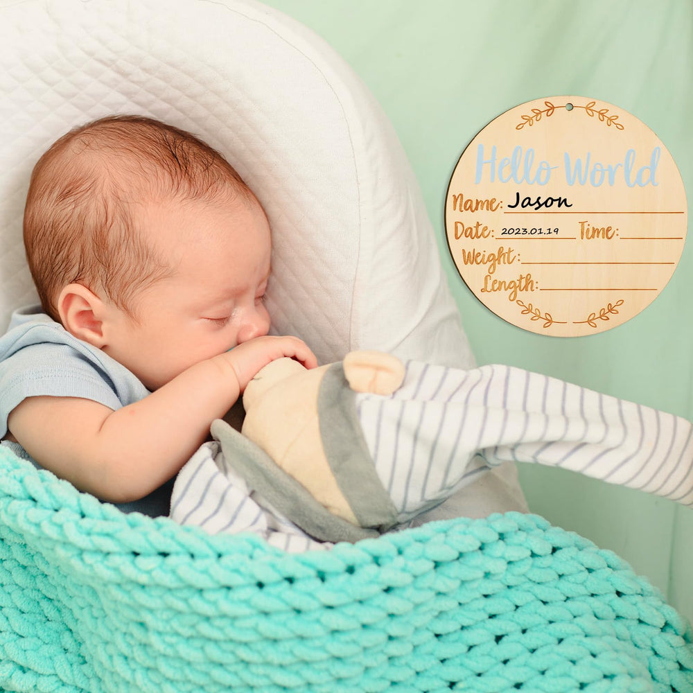 LUTER round sign ready for newborn handprints in nursery decor