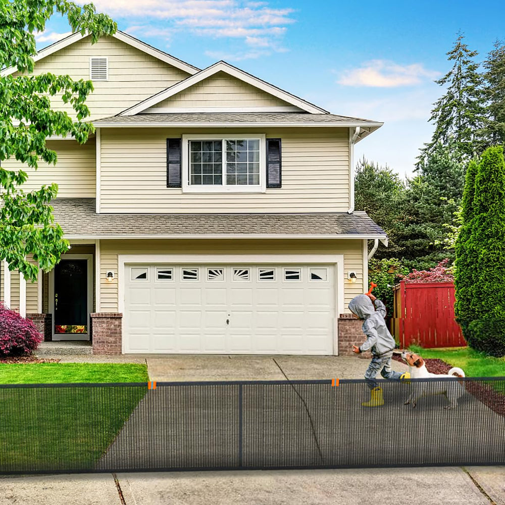 LUTICO Driveway Net Ebony setup shows safe yard barrier for kids at play.