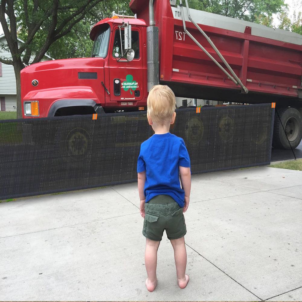 LUTICO Driveway Net ground spike installation shows easy soil anchoring.