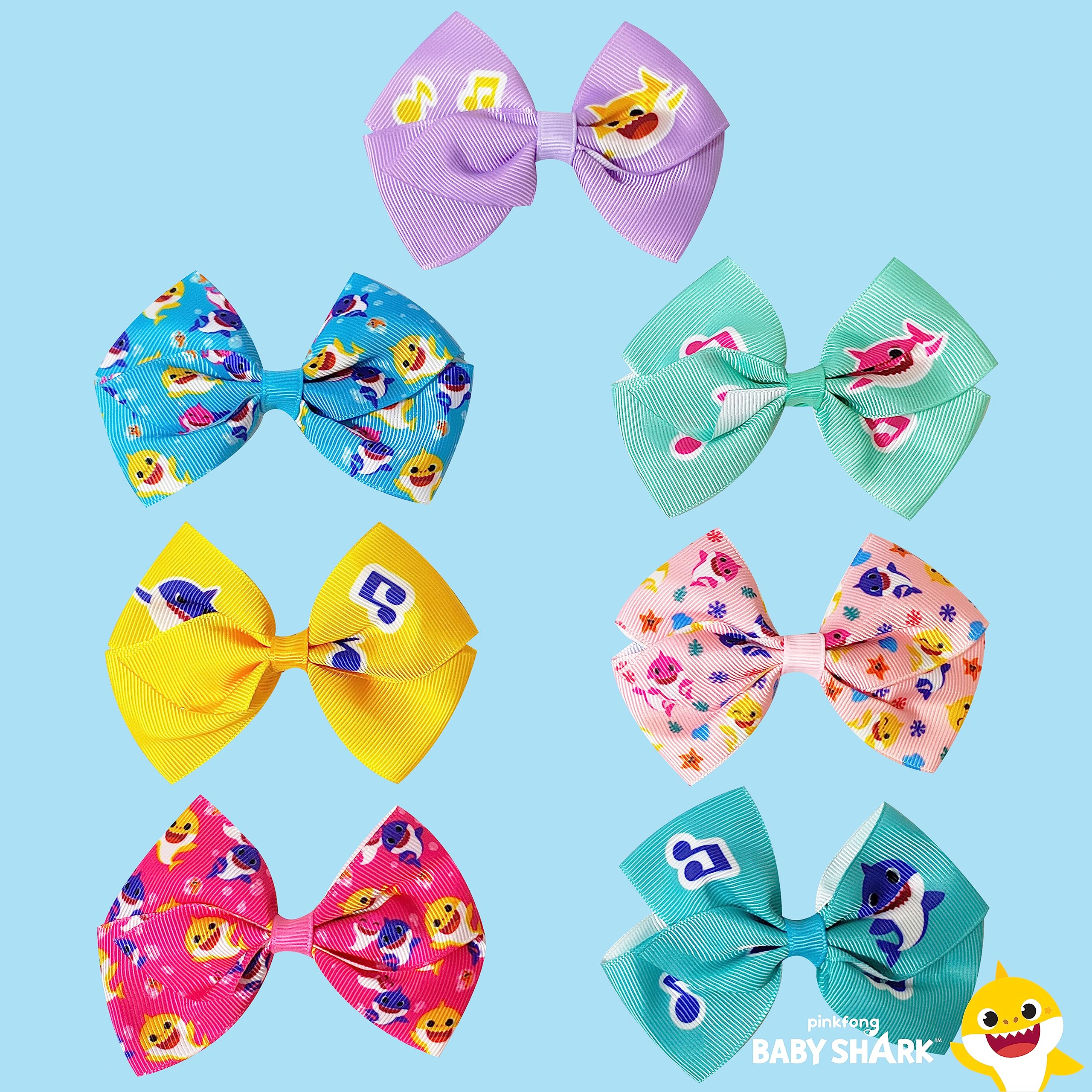 LUV HER Baby Shark hair bows with an alligator clip for secure hold.