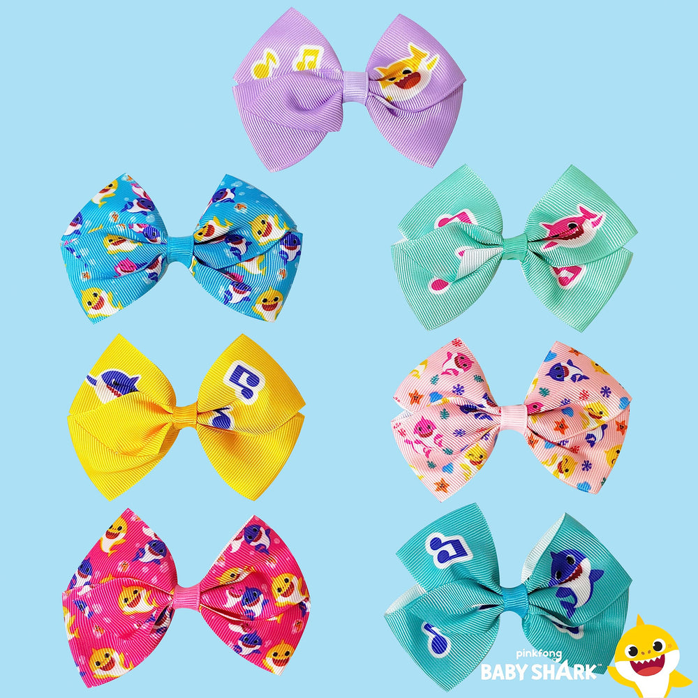 LUV HER Baby Shark hair bows with an alligator clip for secure hold.