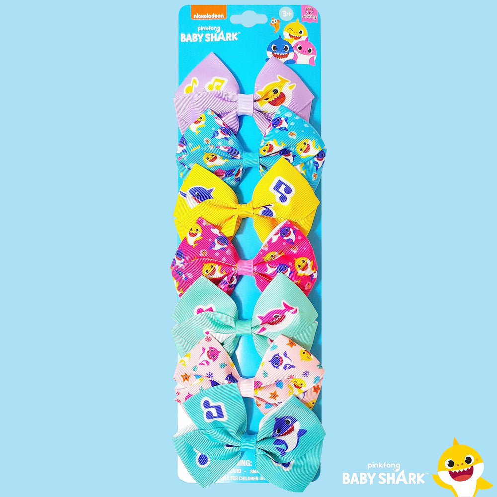 Kids wearing LUV HER Baby Shark bows during playtime for easy styling.