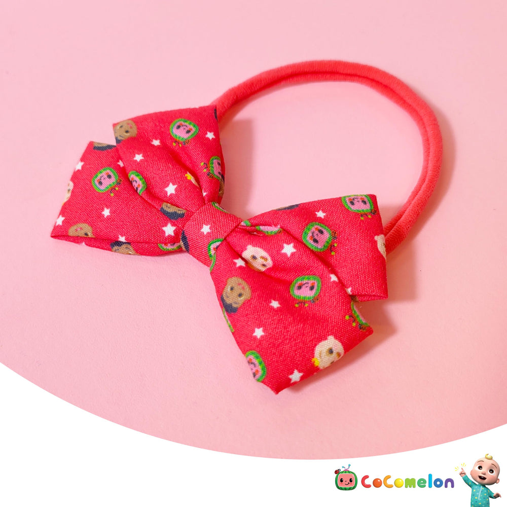 LUV HER cocomellon bow on infant highlighting cute character design and adjustable fit