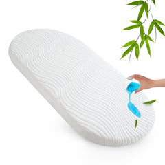 Luv4babe bassinet mattress pad topper on a bassinet protects foam from leaks.