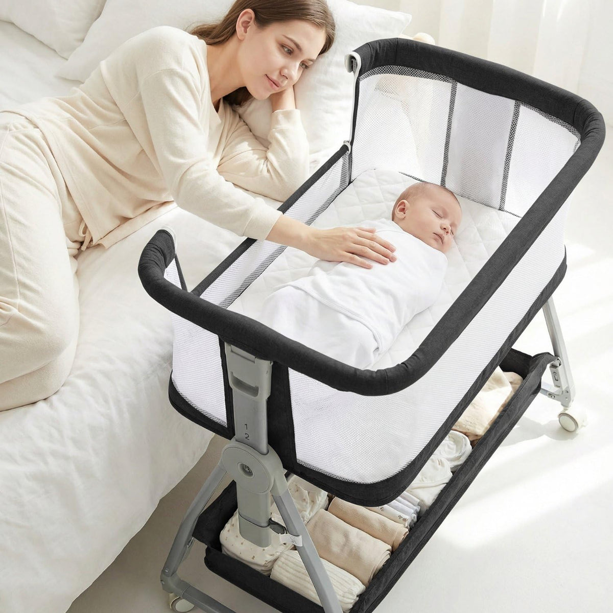 Luvkixen baby bassinet bedside sleeper wheels enable smooth room-to-room mobility.