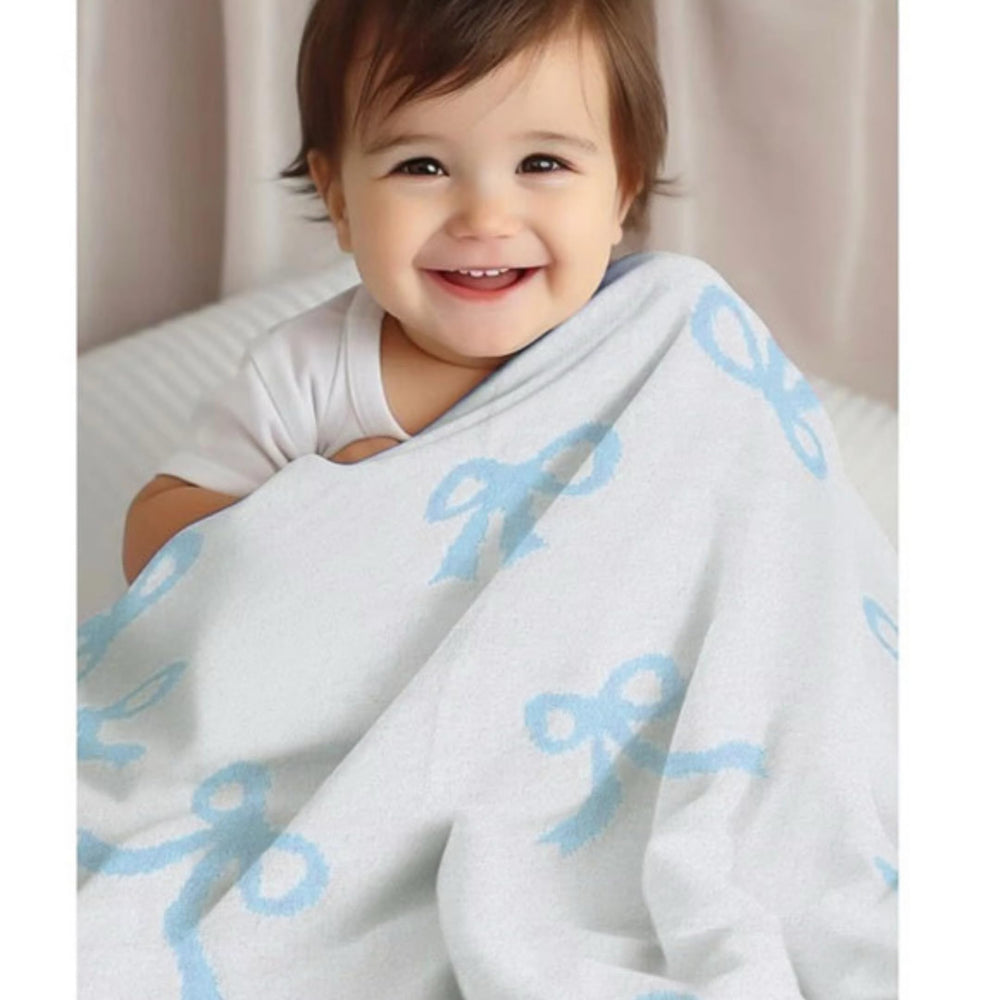 Luxape Bow Blanket blue bows closeup highlighting ultra-soft plush fabric for baby comfort.