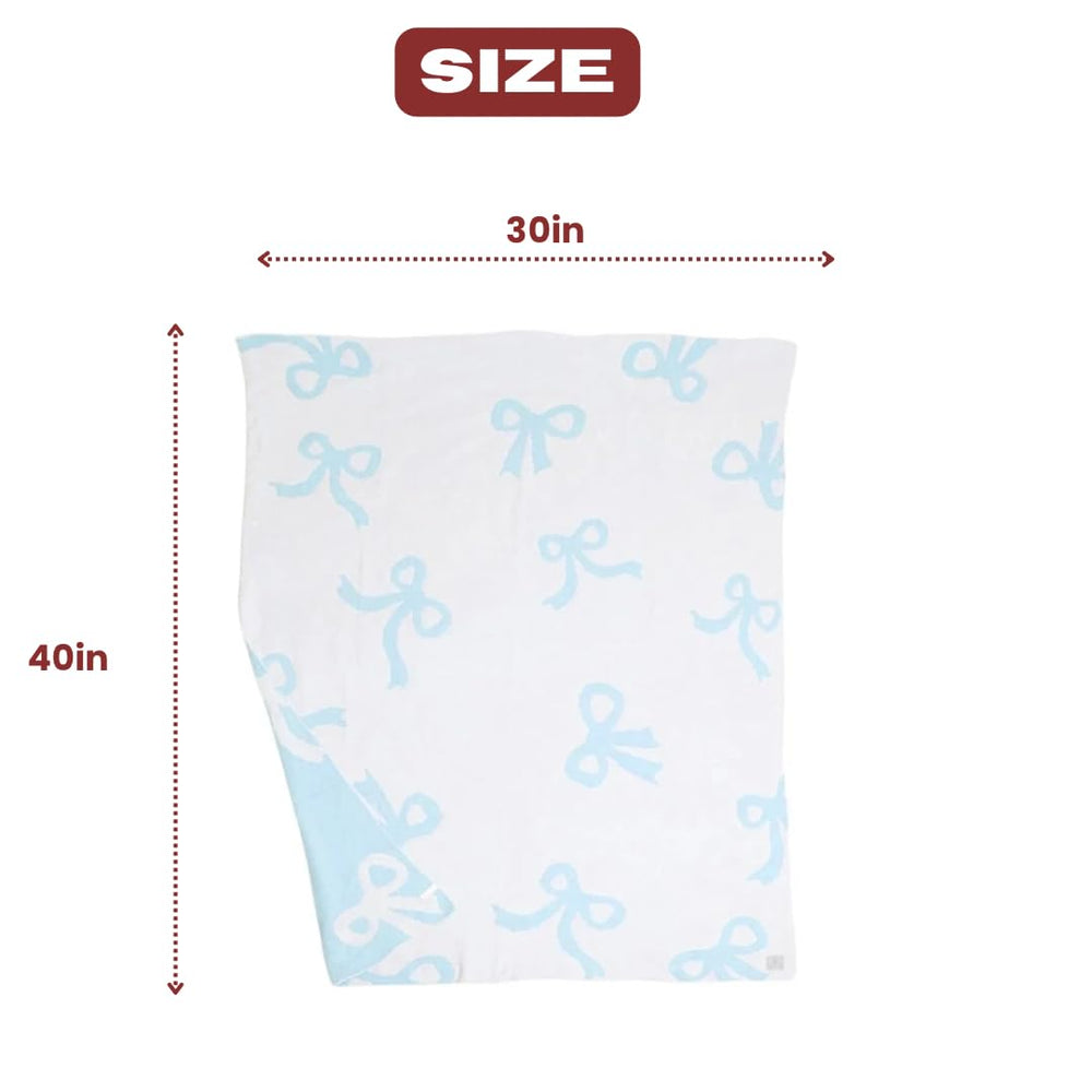 Luxape Bow Blanket large throw use on couch showcases versatile comfort.
