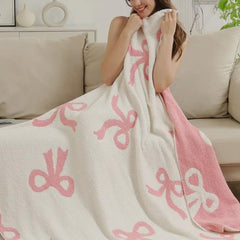 Luxape Bow Blanket pink bows close-up, plush texture for newborn warmth